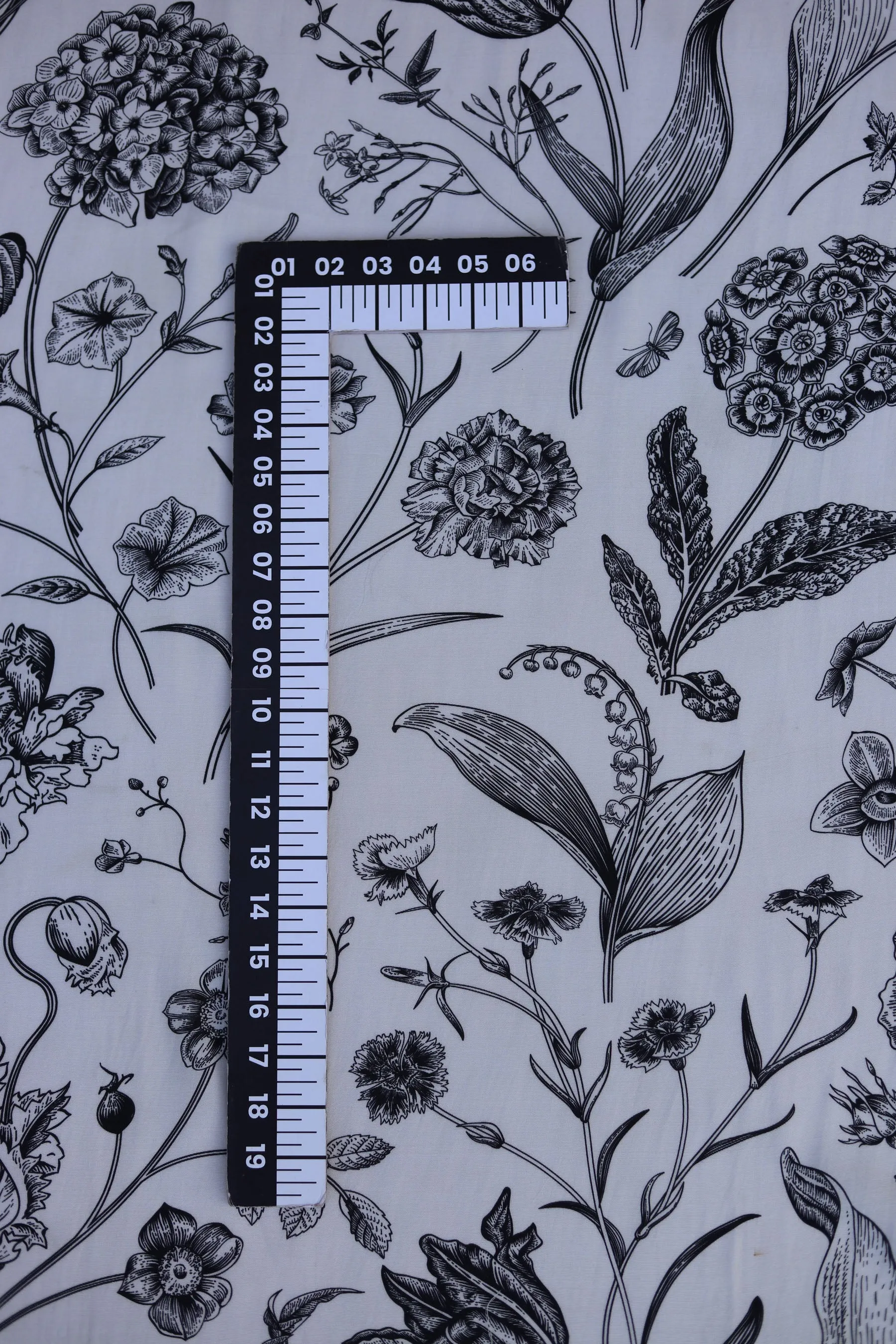 Black and Ivory Intricate Floral Pattern Printed Natural Muslin Silk Fabric